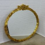 Modern gilt framed oval wall mirror, 125 x 109cm