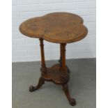 19th century walnut and marquetry inlaid table of trefoil shape, on ring turned legs with a