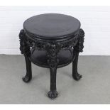 Chinese ebonised two tier table, circular top on carved legs, 52 x 58cm