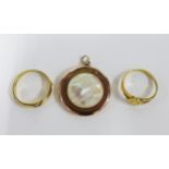 9ct gold locket, 14ct gold ring and a yellow metal ring (3)