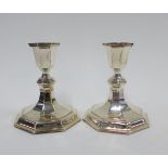 A pair of silver knop stemmed desk candlesticks, Mappin & Webb, London 1992, on octagonal weighted