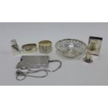 George V silver bonbon dish, Birmingham 1911, two silver napkin rings, miniature silver bottle