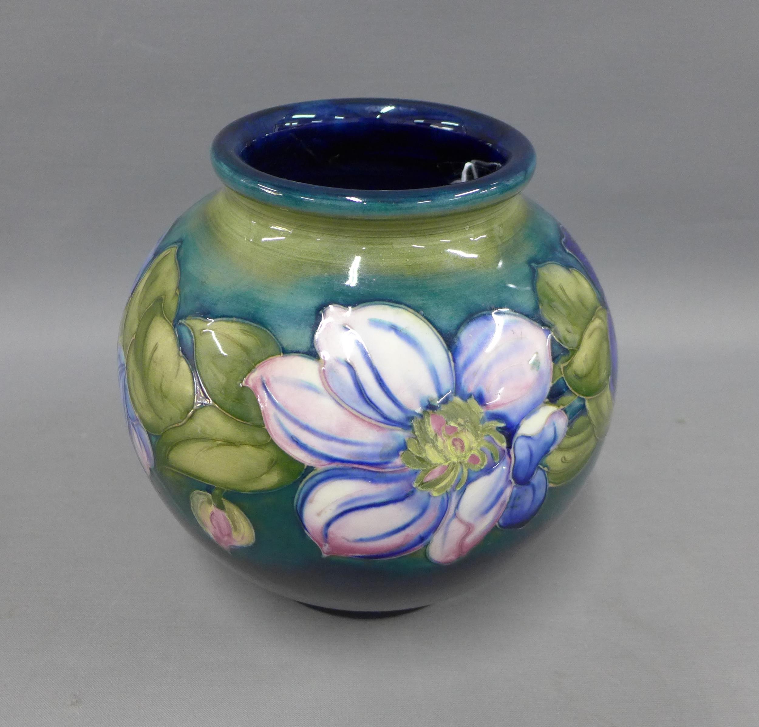 Moorcroft vase in Clematis pattern against a blue ground, impressed facsimile signature and - Image 2 of 3