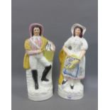 Pair of 19th century Staffordshire pottery Fisherman and Fisherwoman figures, 34cm (2)