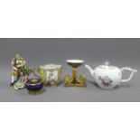 Meissen porcelain teapot, white ground painted with flowers, the lid with a flowerhead finial,