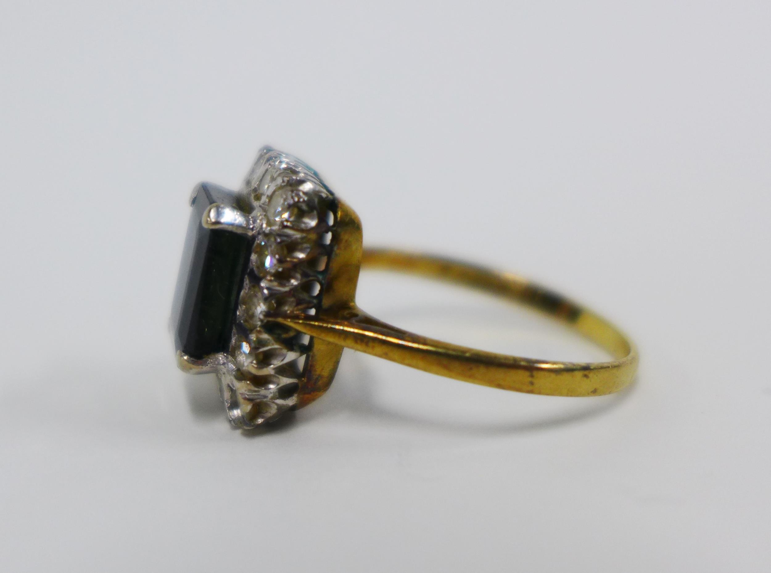 18ct gold sapphire and diamond cocktail ring, claw set with an emerald cut sapphire within a - Image 3 of 4