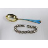David Andersen blue enamel and silver gilt spoon and a David Anderson silver and enamel flowerhead