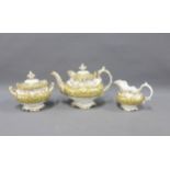Early 19th century English porcelain part teaset comprising teapot, sucrier and cream jug, (3)