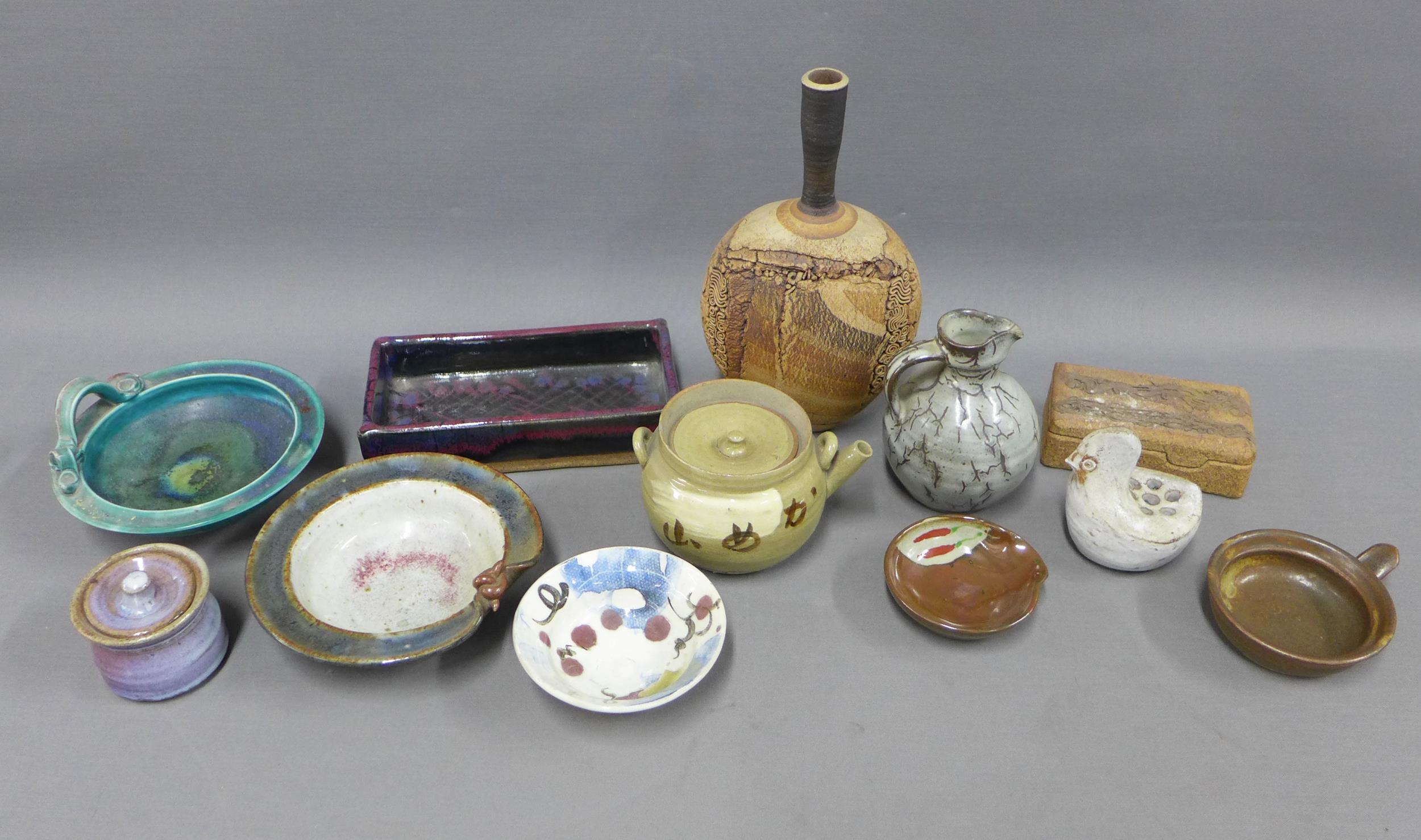 Collection of studio pottery to include vases, rectangular dish, plates, etc (12)