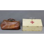 Early 20th century brown leather Gladstone and a vintage first aid box, (2)