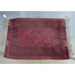 Small Bokhara rug, red field, 112 x 79cm