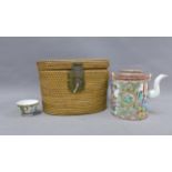Chinese famille rose wine / teapot and two teabowls, one damaged) all contained within a basket, (3)