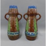 Pair of early 20th century Belgium art pottery vases, brown glazed with leaf pattern and loop