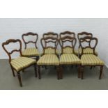 Set of eight early Victorian rosewood dining chairs with open backs and c scrolls, with serpentine