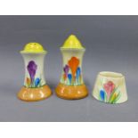 Clarice Cliff Crocus pattern salt and pepper pots and a Spring pattern mustard, (3)