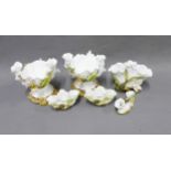 A pair of Moore Bros white glazed porcelains posy vases, floral encrusted, 16cm, Moore Bros white