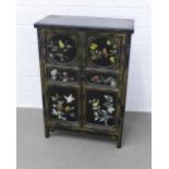 Black lacquered chinoiserie cabinet, two doors decorated with with coloured hardstone birds and with