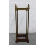 Early 20th century brass stick stand, two divisions, with painted base, 62cm high