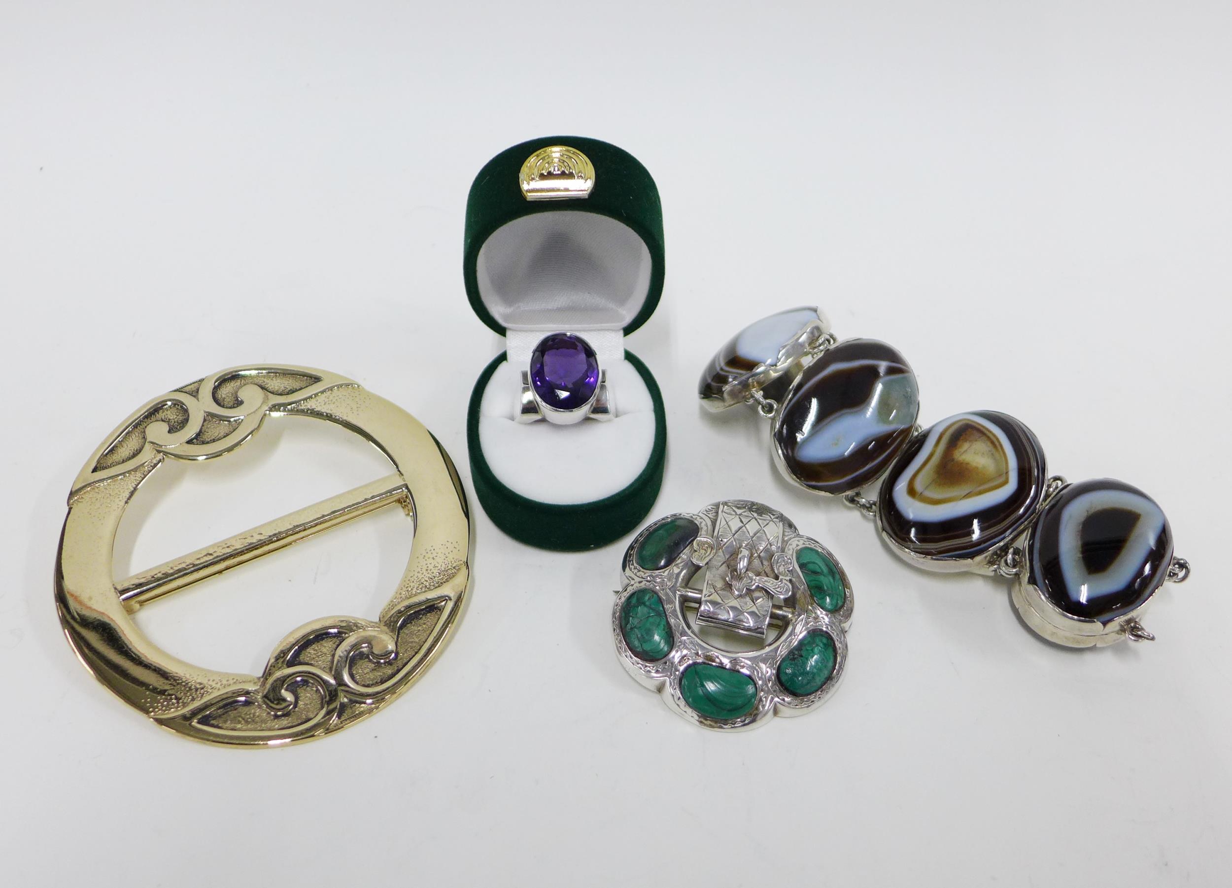 Silver and agate bracelet, silver and amethyst ring, white metal and green hardstone brooch and an