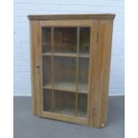 Pine corner cabinet, glazed door and shelved interior, 77 x 94 x 39cm