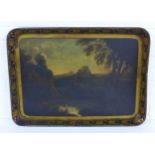 Georgian papier mache tray with a castle scene within a gilded leaf border, 76 x 55cm