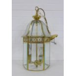 Hexagonal brass and glass panelled hall lantern light fitting, 43cm approx.