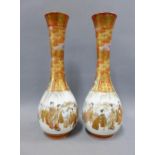 A pair of Japanese Meiji period Kutani porcelain vases, of bottle form and painted with figures by a