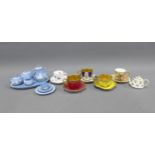Collection of miniature porcelain cabinet cups and saucers to include Coalport, Royal Worcester