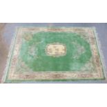 Chinese wool rug, pale green field with central panel with birds and flowers, 276 x 186cm