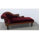 Victorian mahogany chaise longue with carved fruit and vine frame and legs, upholstered in maroon