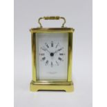 French brass and glass panelled carriage clock retailed by Hamilton & Inches, movement signed