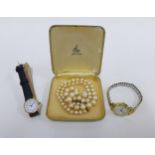 Lady's 9ct gold Rotary wristwatch on a black leather strap together with a vintage Roamer gold