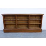 Late 19th / early 20th century oak open bookcase with three bays and six fixed shelves,