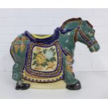 Large glazed veranda style stool in the form of a Tang horse, 56 x 42cm