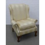 Upholstered armchair on carved cabriole legs with claw and ball feet, 87 x 104 x 55cm