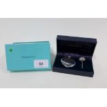 Tiffany & Co silver scent bottle of heart shape together with a scent funnel, complete with
