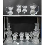 Collection of thistle etched crystal to include a pair of decanters with stoppers, set of seven wine
