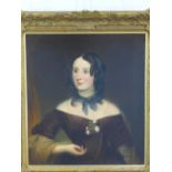 Half length oil on canvas portrait of a woman, apparently unsigned, contained within an ornate