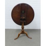 19th century mahogany tilt top table, circular dished top on a birdcage action and baluster column
