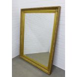 Gilt framed wall mirror with rectangular bevelled glass plate, 113 x 140cm
