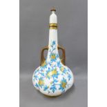 Royal Worcester lobbed vase and cover, with side handles, painted with gilded flowers and