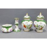Dresden porcelain to include a air of lidded jars, candlestick and a small jar and cover 15cm (4)