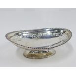 George V silver pedestal bowl, with gadrooned edge and pierced rim, on a pedestal foot, James Dixon,