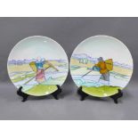 A pair of continental pottery plates, each with tube line pattern, 25cm (2)