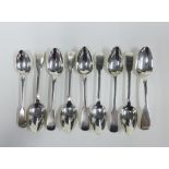 A collection of Old English fiddle pattern silver teaspoons, mixed hallmarks and markers to