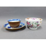 Chinese cafe au lait blue and white glazed tea bowl and saucer (chip to saucer) and a famille rose