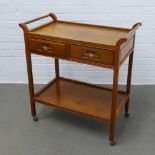 Chinese hardwood two tier trolley, with curved handles, single drawer with inset handle and