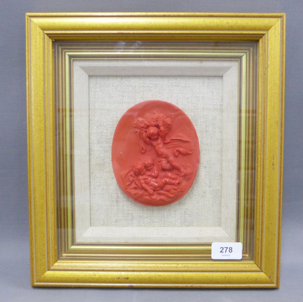 Red wax plaque of cherubs playing, framed with a glazed show frame, James McClure label verso, - Image 2 of 2