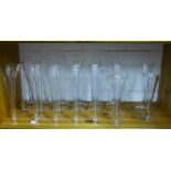 Twenty clear glass champagne glasses (20)