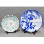 Large blue and white chinoiserie pottery charger and another of smaller size (2) 40cm